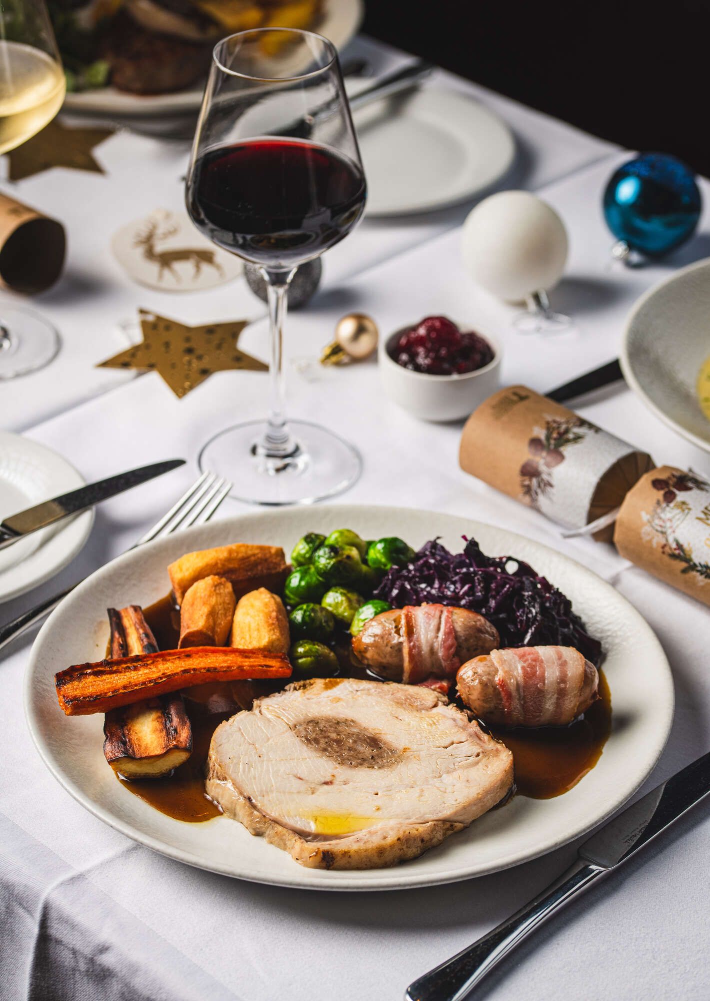 A beautifully plated Christmas turkey dinner, a perfect centrepiece for your Christmas party in Farringdon, surrounded by festive trimmings.