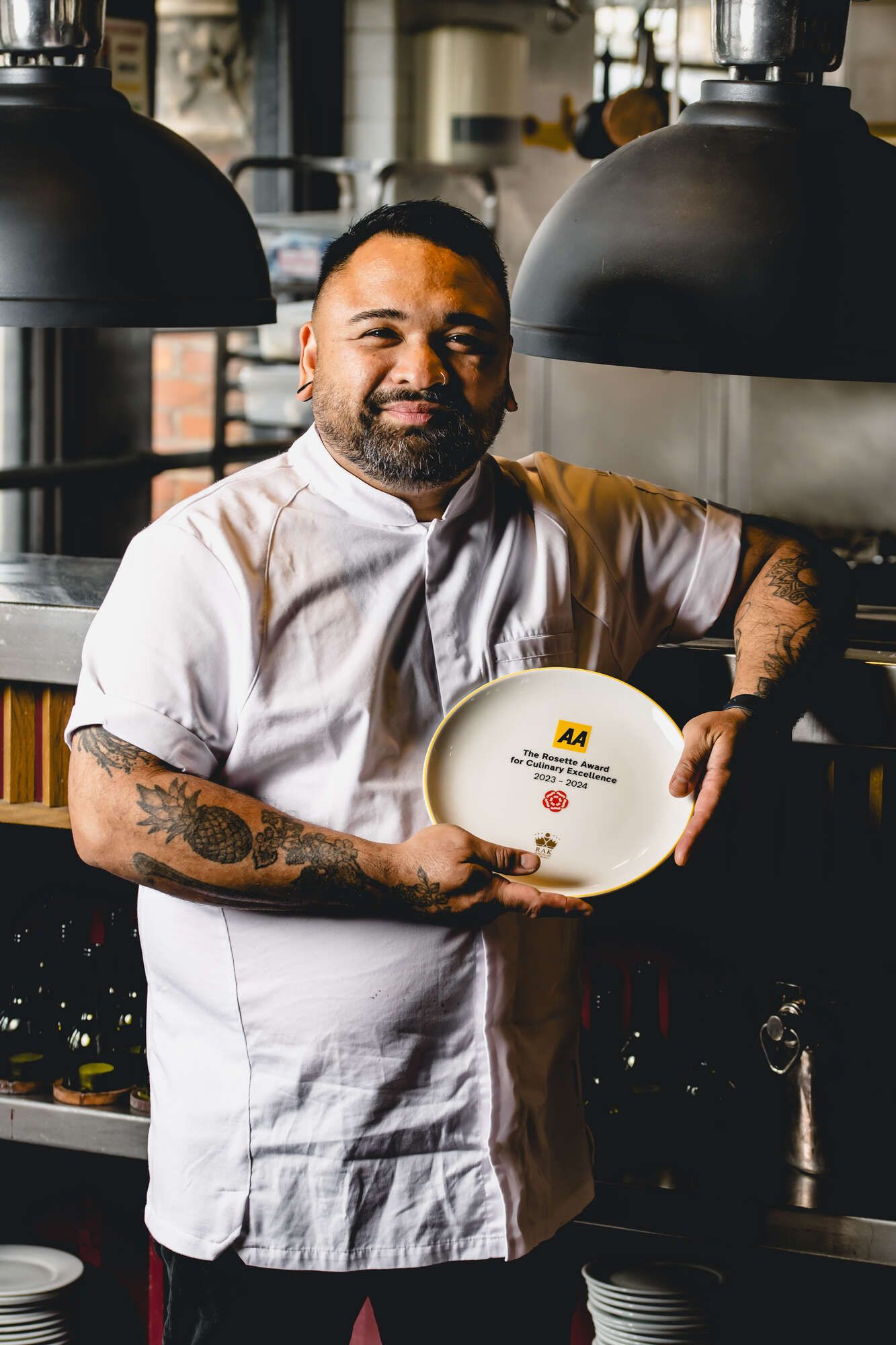 Head Chef Tim Dela Cruz holds the AA Rosette Award for outstanding food quality at The Grill steakhouse restaurant in Farringdon