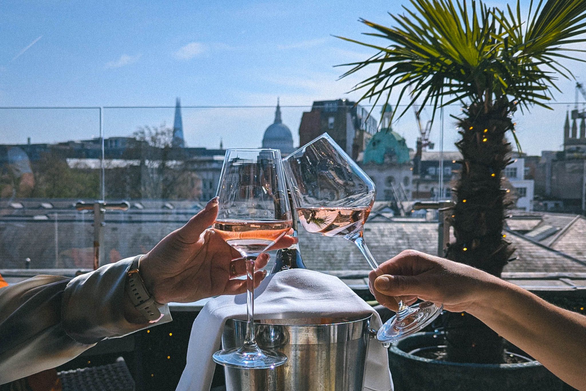 rooftop cocktail bar with wine and views of london and st pauls