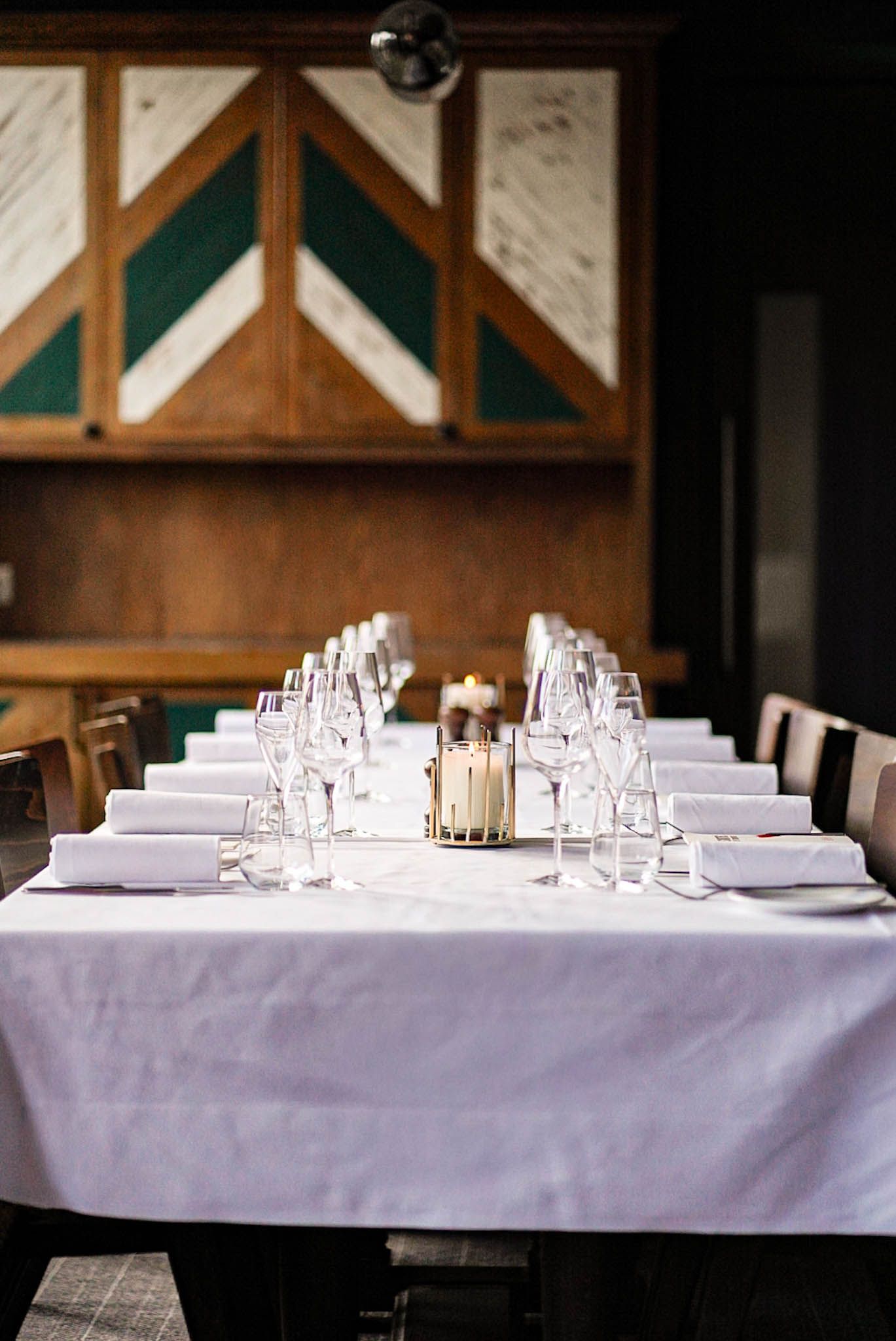 One of the elegant private dining rooms at The Grill, set for a 7-course tasting menu experience for groups of 6 to 28 guests.