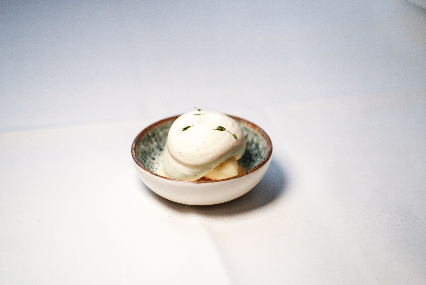 A refreshing seasonal pre-dessert served to cleanse the palate before the final sweet course of the 7-course tasting menu.