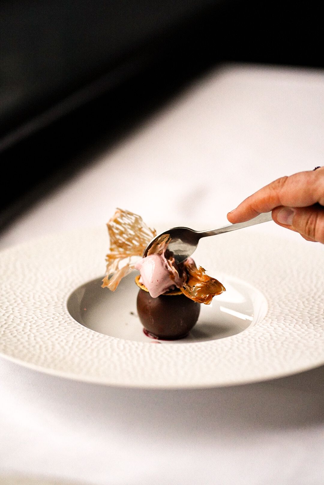 The decadent Mayan chocolate dessert with sour cherry and cherry ice cream, serving as the final sweet course of the 7-course tasting menu at The Grill.